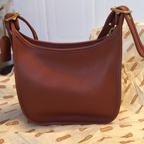 Coach Handbags - Vintage Coach Tan Hobo. New. No damages.